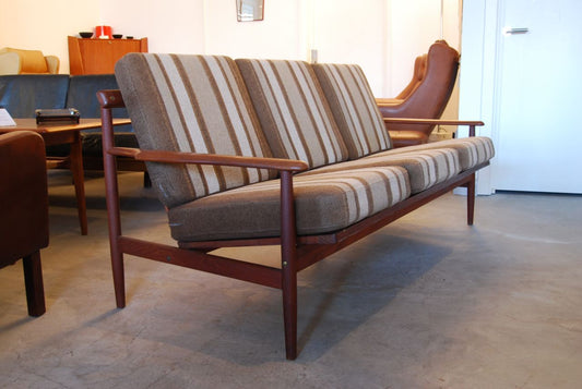 Teak-framed three seater