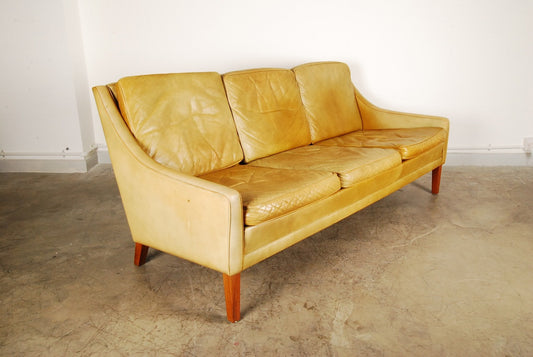 Three seat sofa on rosewood legs