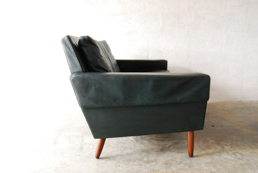Two seat sofa in leather