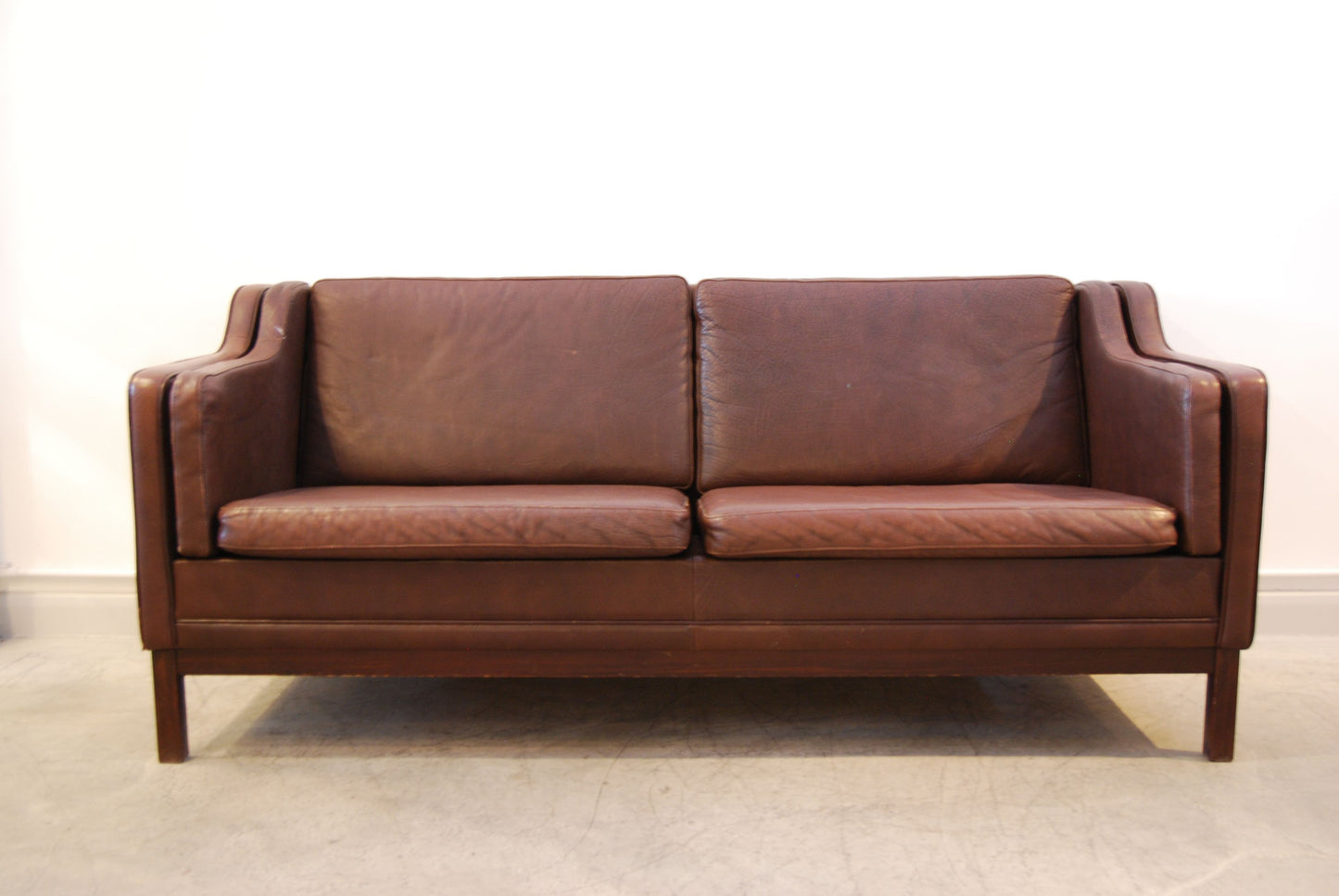 Three seat sofa in chocolate brown leather