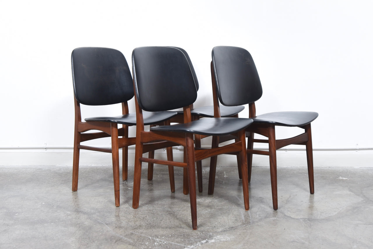 Set of four dining chairs in teak and skai
