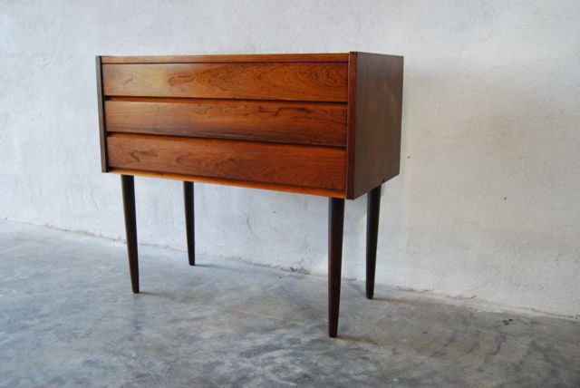 Short chest of drawers in rosewood