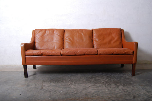 Three seater in cognac leather