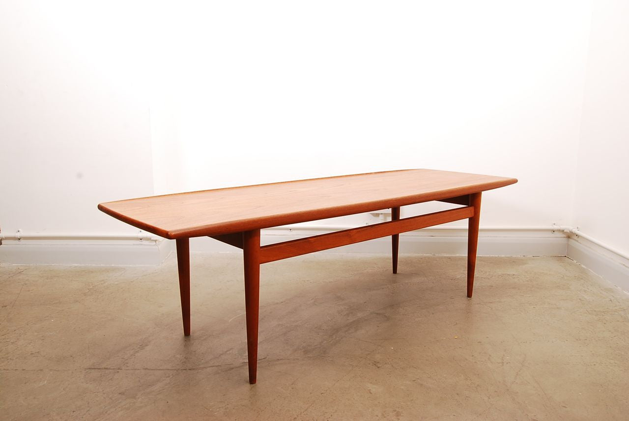 Teak coffee table with lipped edge