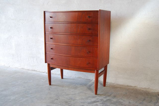 Bow-fronted chest of drawers in teak