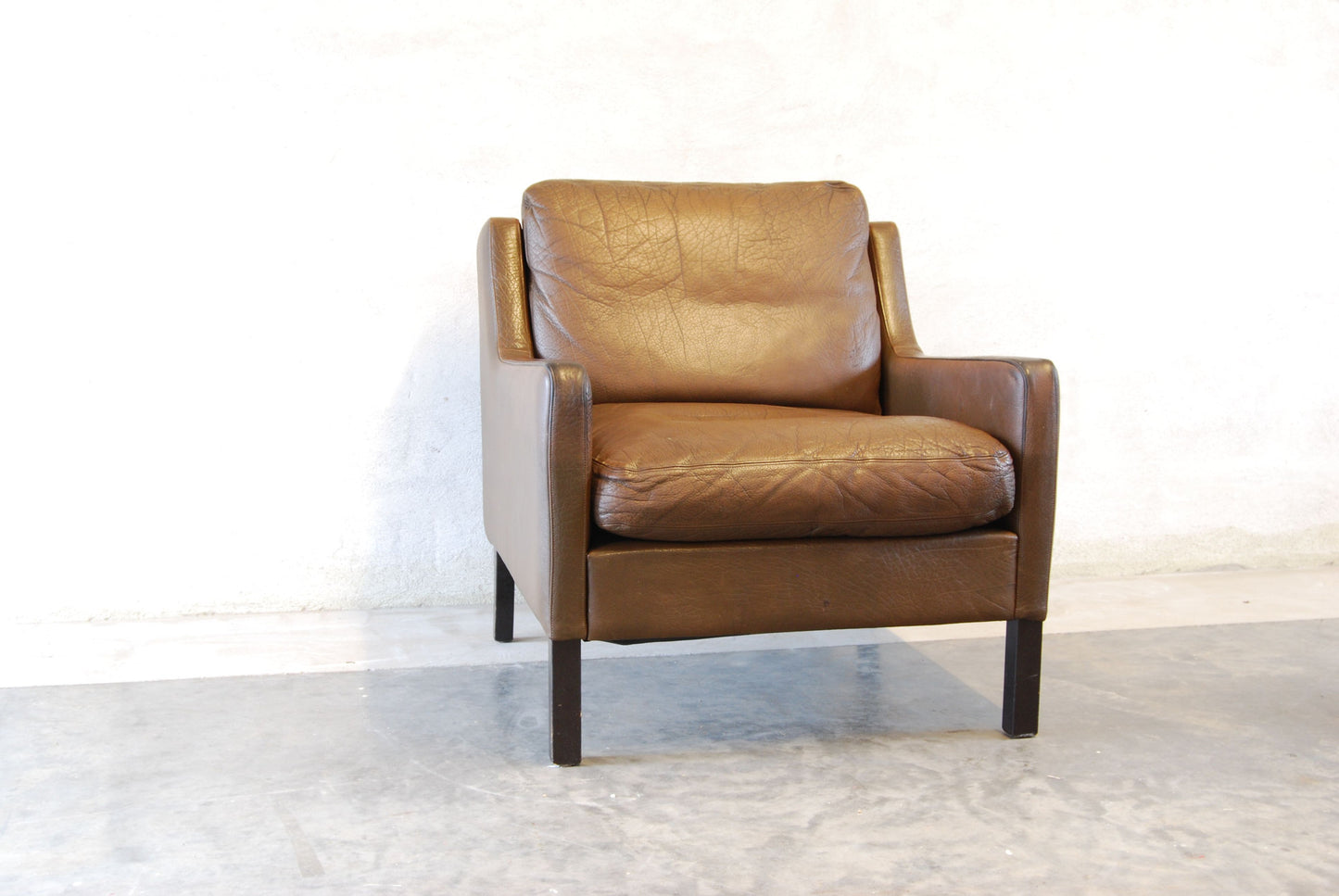 Lounge chair in buffalo leather