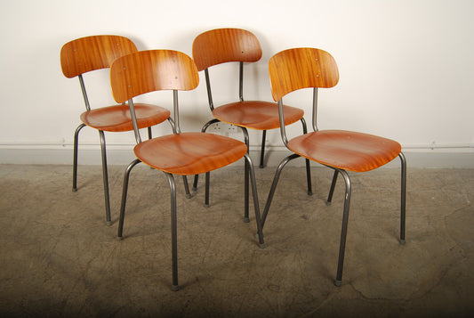 Set of four stacking teak chairs