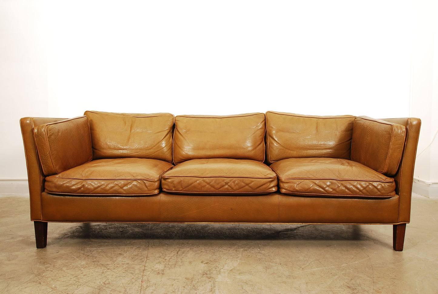 Three seat sofa in buffalo leather
