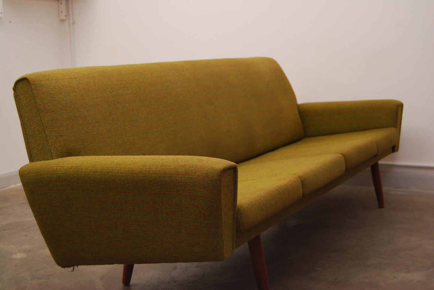Four seat sofa in olive green wool
