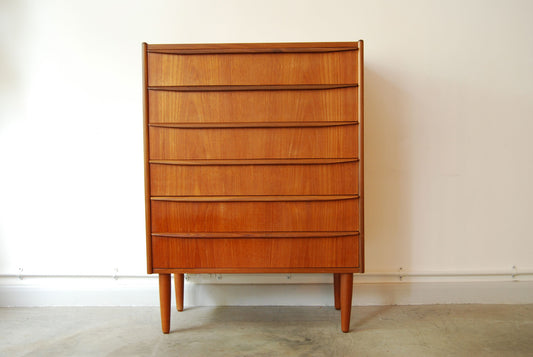 Teak chest of drawers with lipped handles