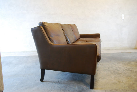 Three seat sofa in buffalo leather