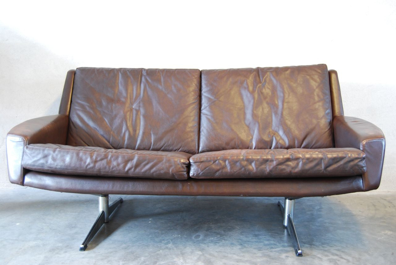 Two seat leather sofa with chrome base