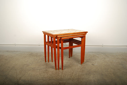 Nest of tables in teak