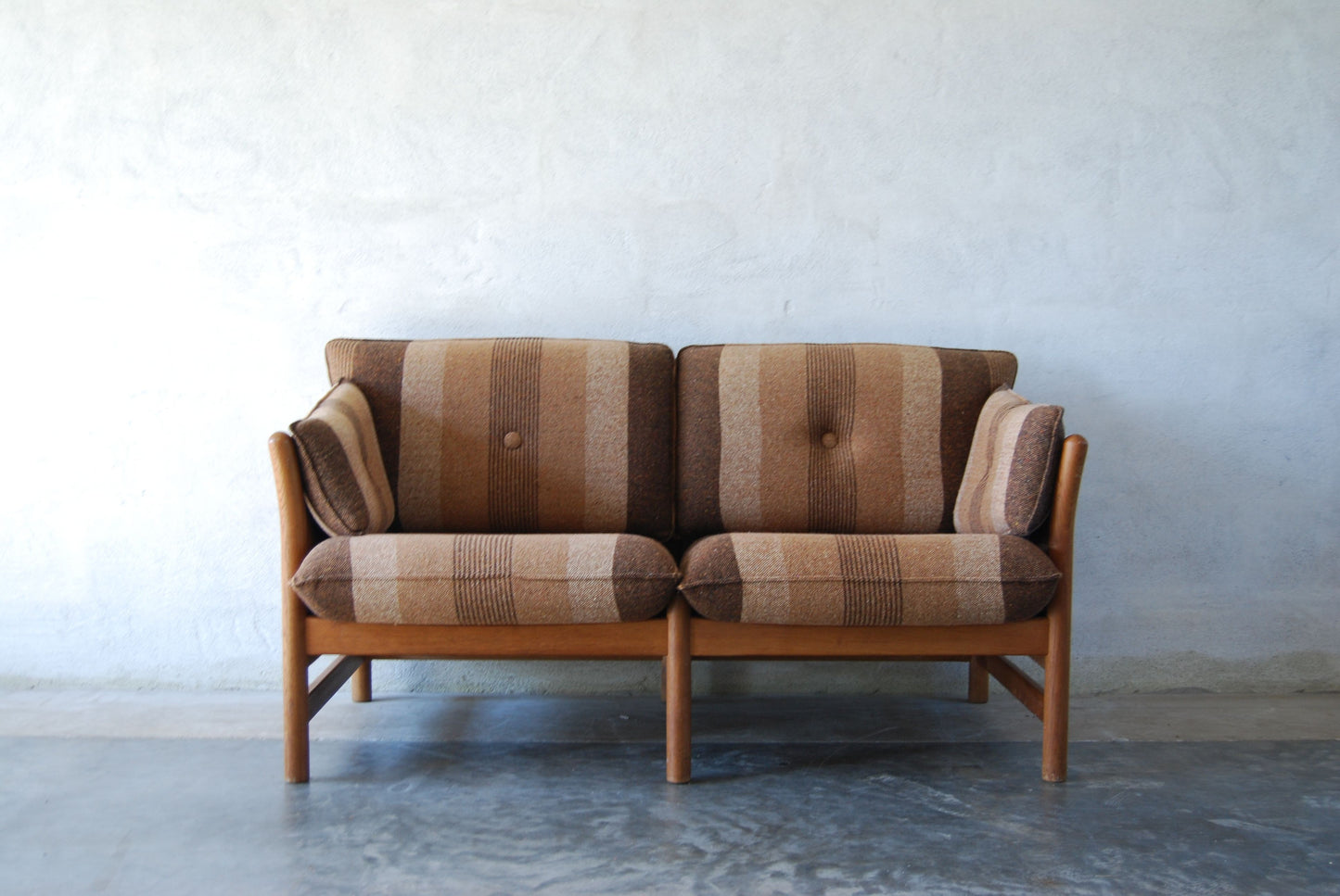 Two seat oak-framed sofa