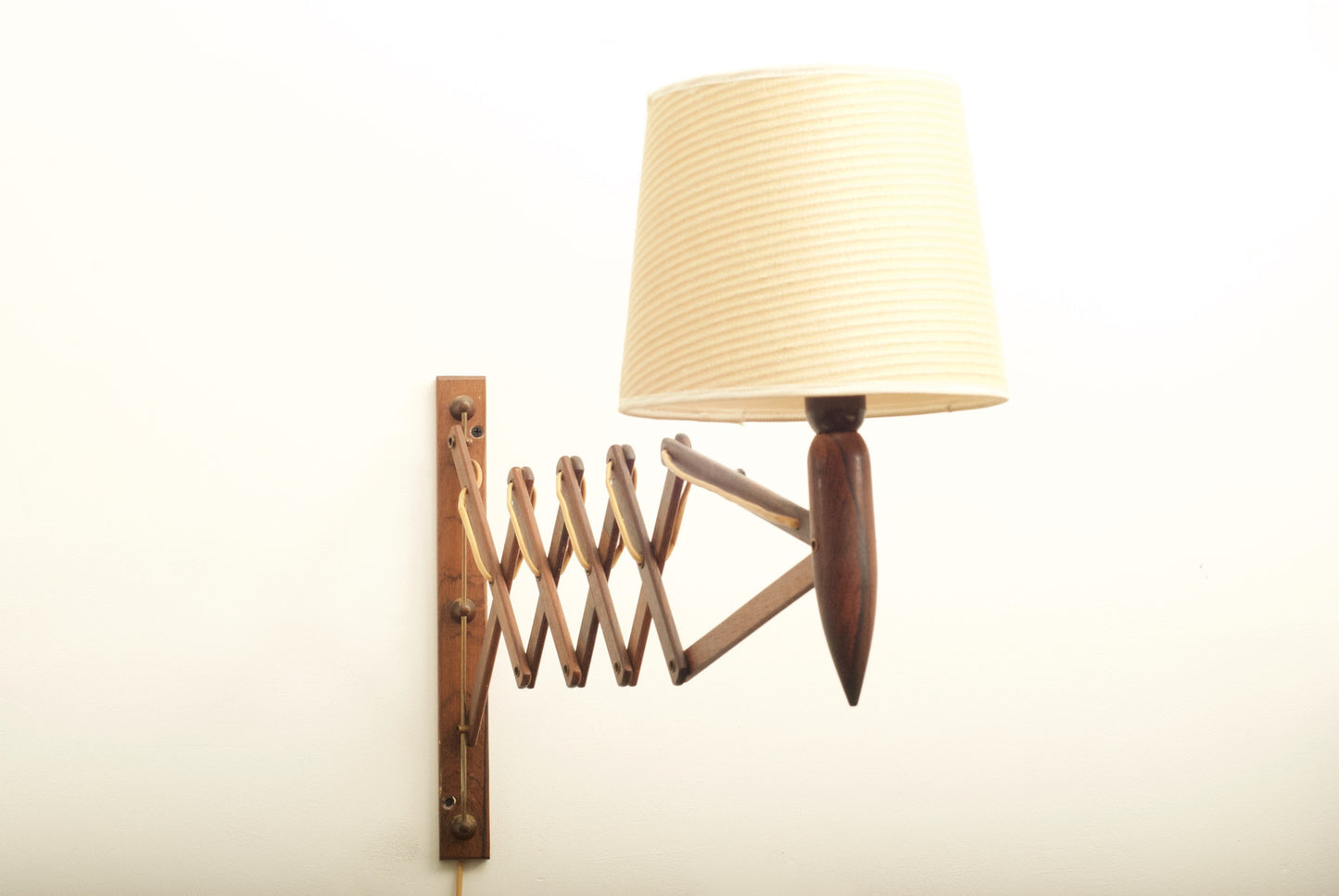 Rosewood scissor wall light