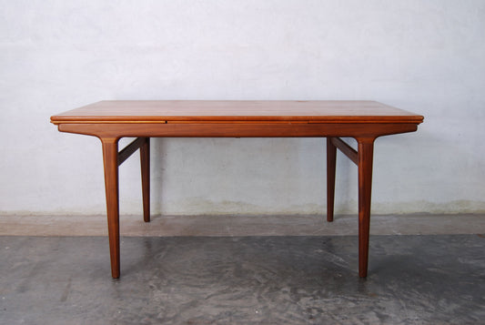 Large teak dining table by Johannes Andersen