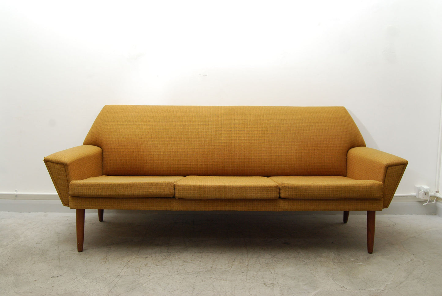 Three seat sofa in mustard yellow
