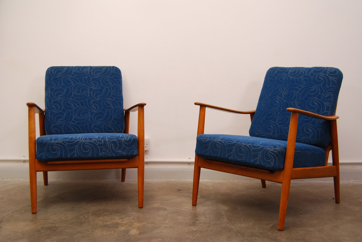 Pair of oak and teak lounge chairs