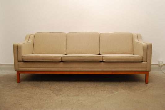 Light wool three seater in style of Mogensen