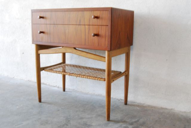 Short chest of drawers with cane shelf
