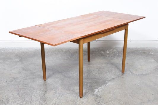 Extending teak dining table with beech base + legs