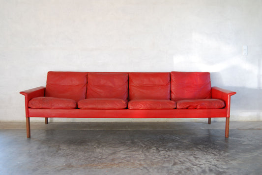 Four seat leather sofa by Hans Olsen