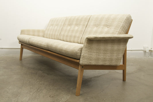 Light wool and oak three seater