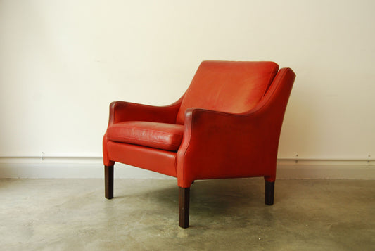 Red leather club chair