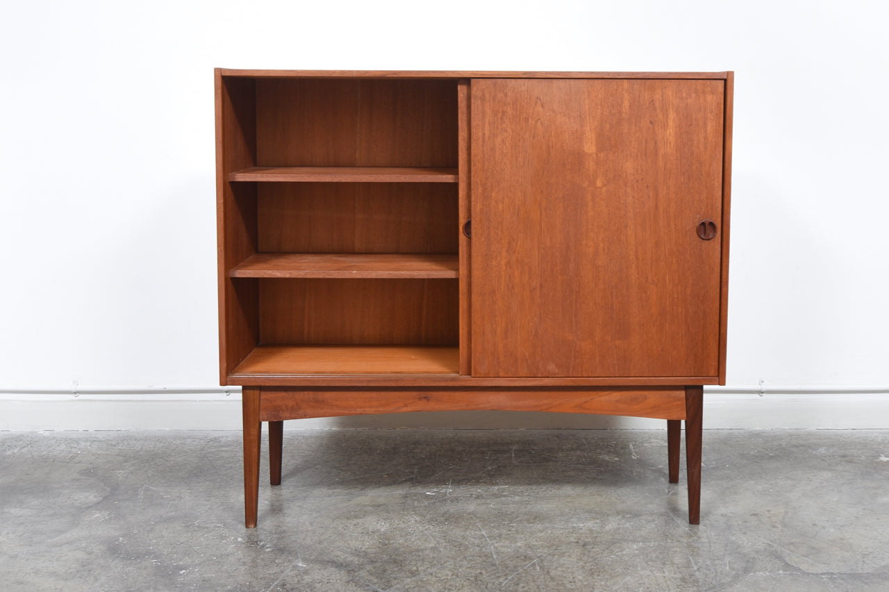 1960s teak storage cabinet with sliding doors