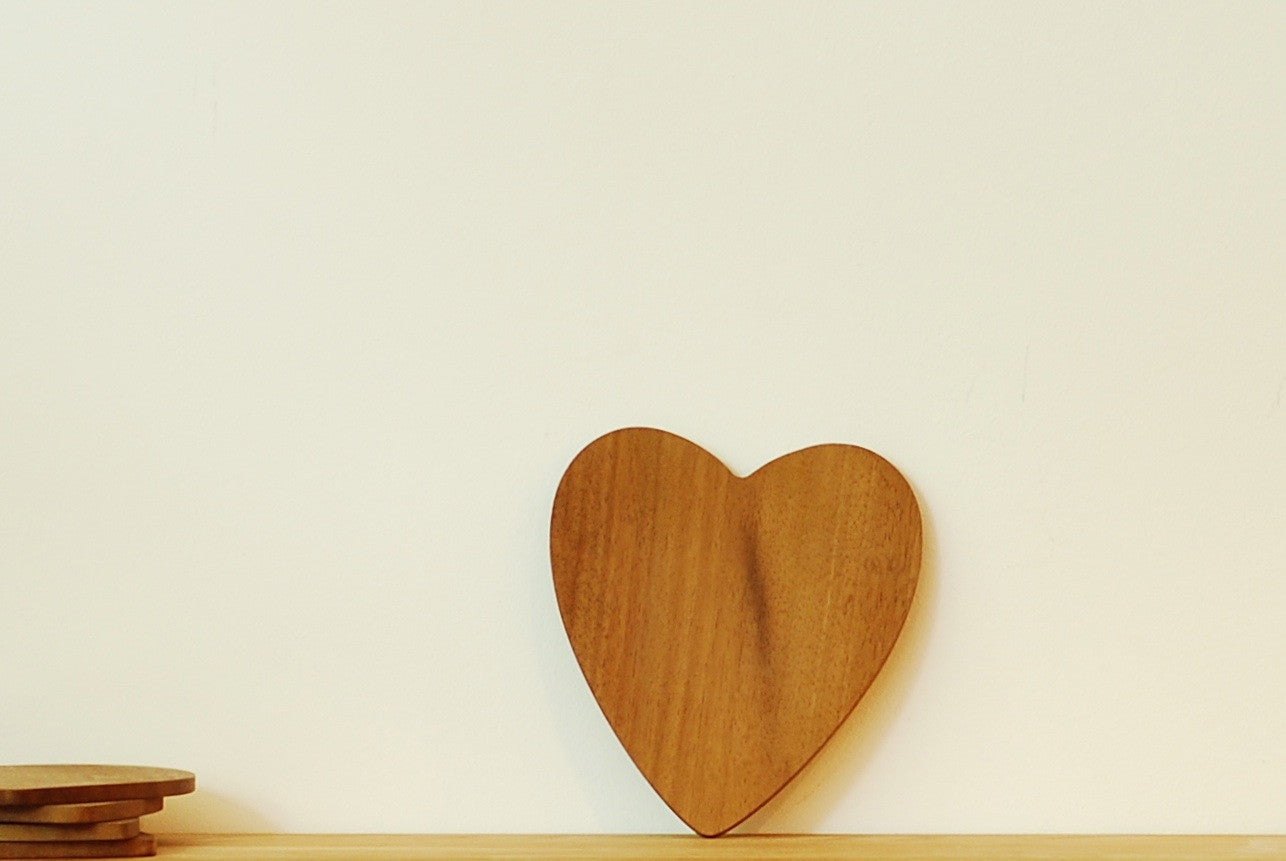 Heart shaped teak coasters