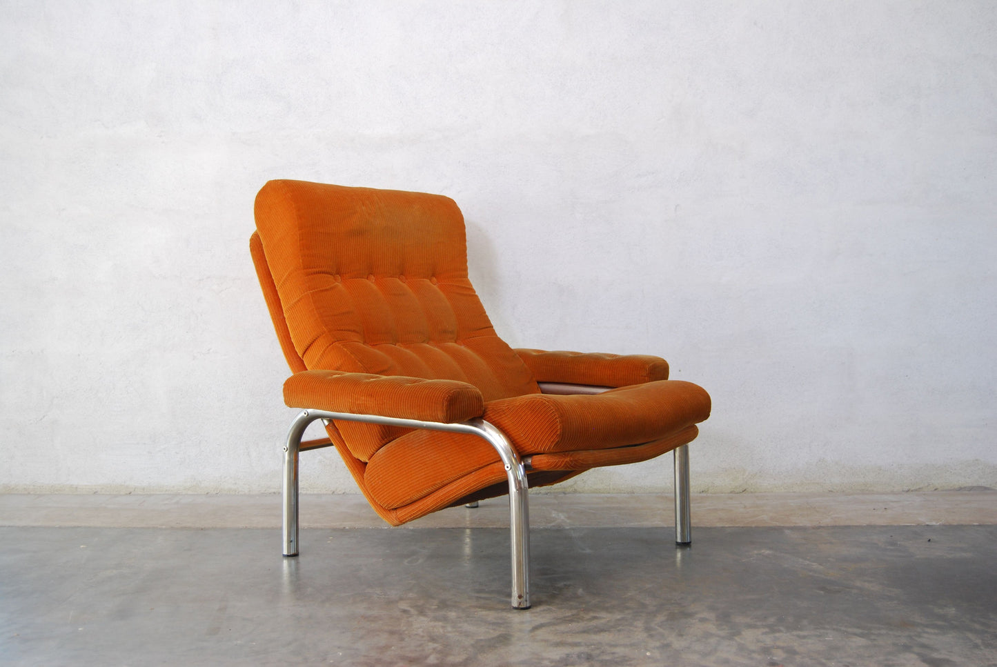 Chrome and corduroy lounge chair