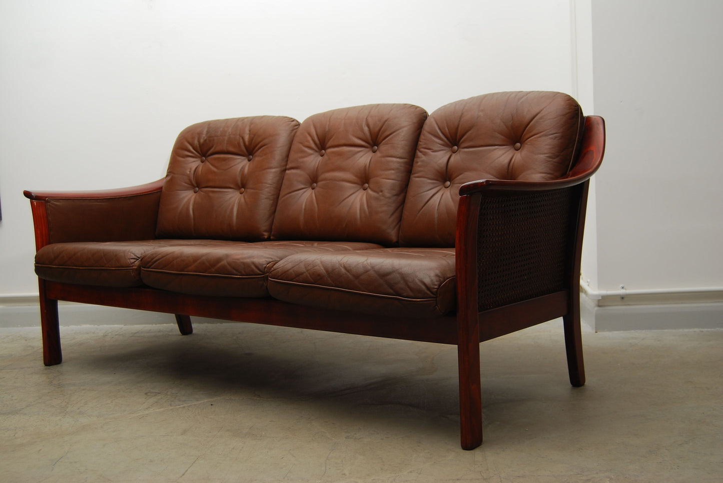 Three seat leather and beech sofa