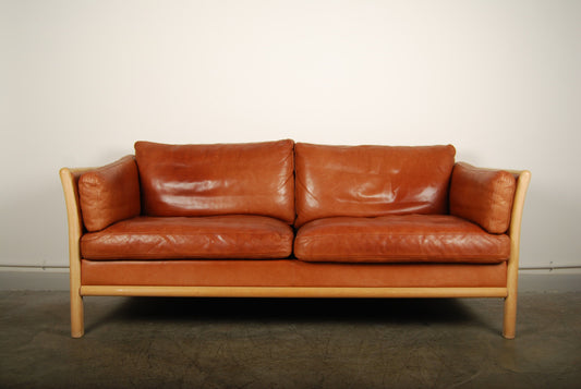 Two and a half seat leather sofa