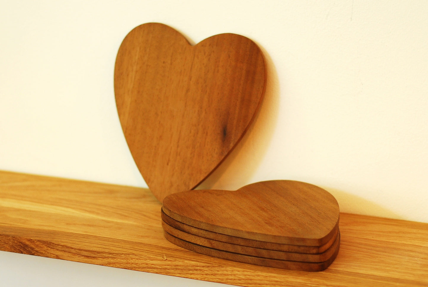 Heart shaped teak coasters