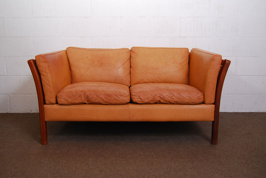 Two seat leather sofa by Stouby