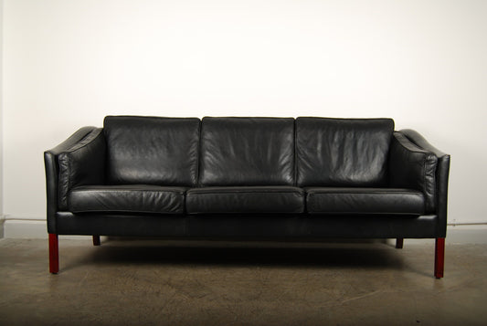 Three seat leather sofa by Stouby