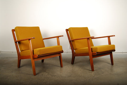 Pair of teak lounge chairs