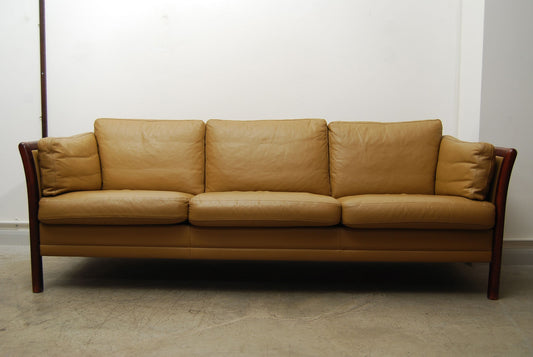 Three seat leather sofa by Stouby