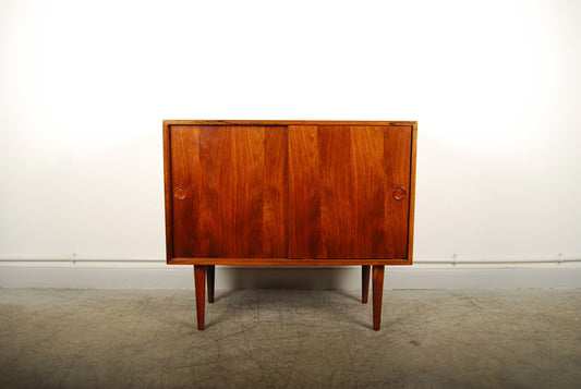 Short sideboard in rosewood with sliding doors