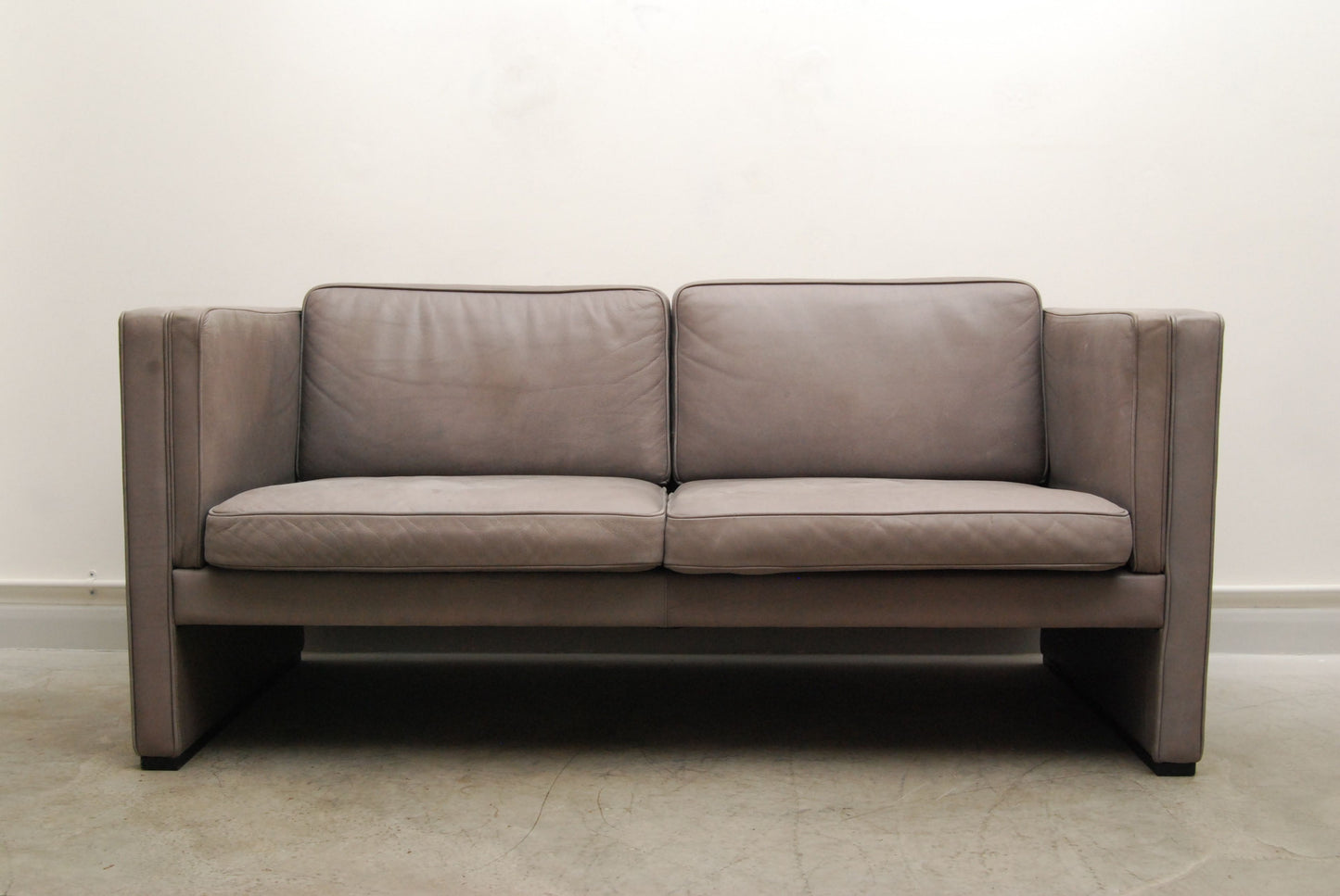 New price: Two seat sofa in gray leather