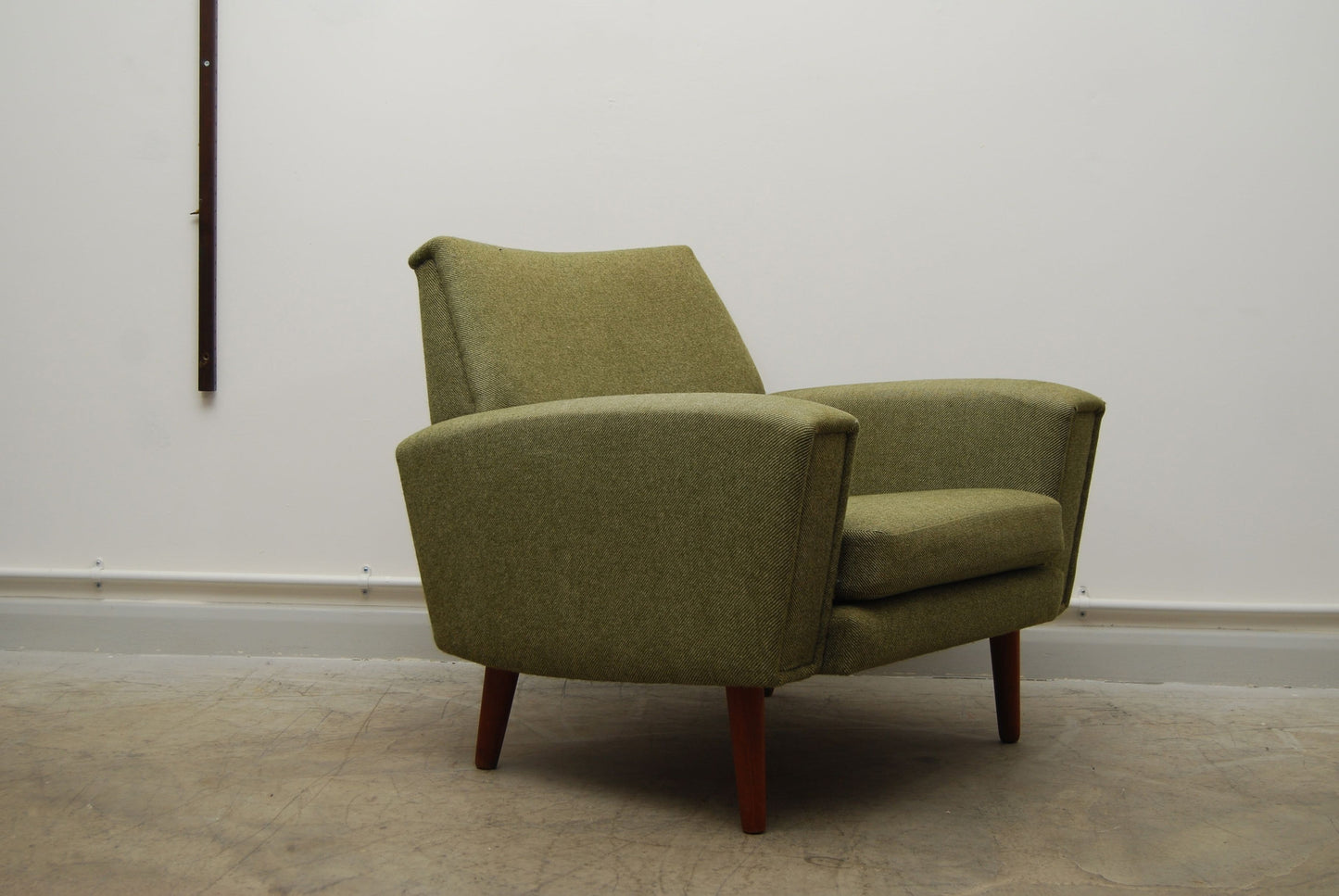 Lowback lounge chair in tweed