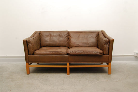 Scalloped back two seat sofa