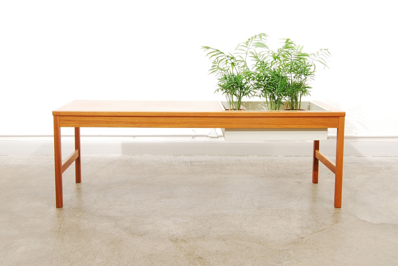 Coffee table with planter