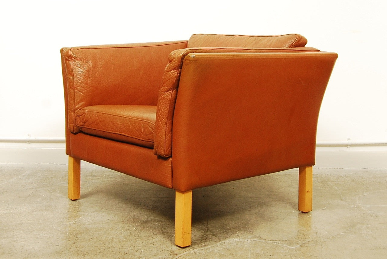Tan leather club chair