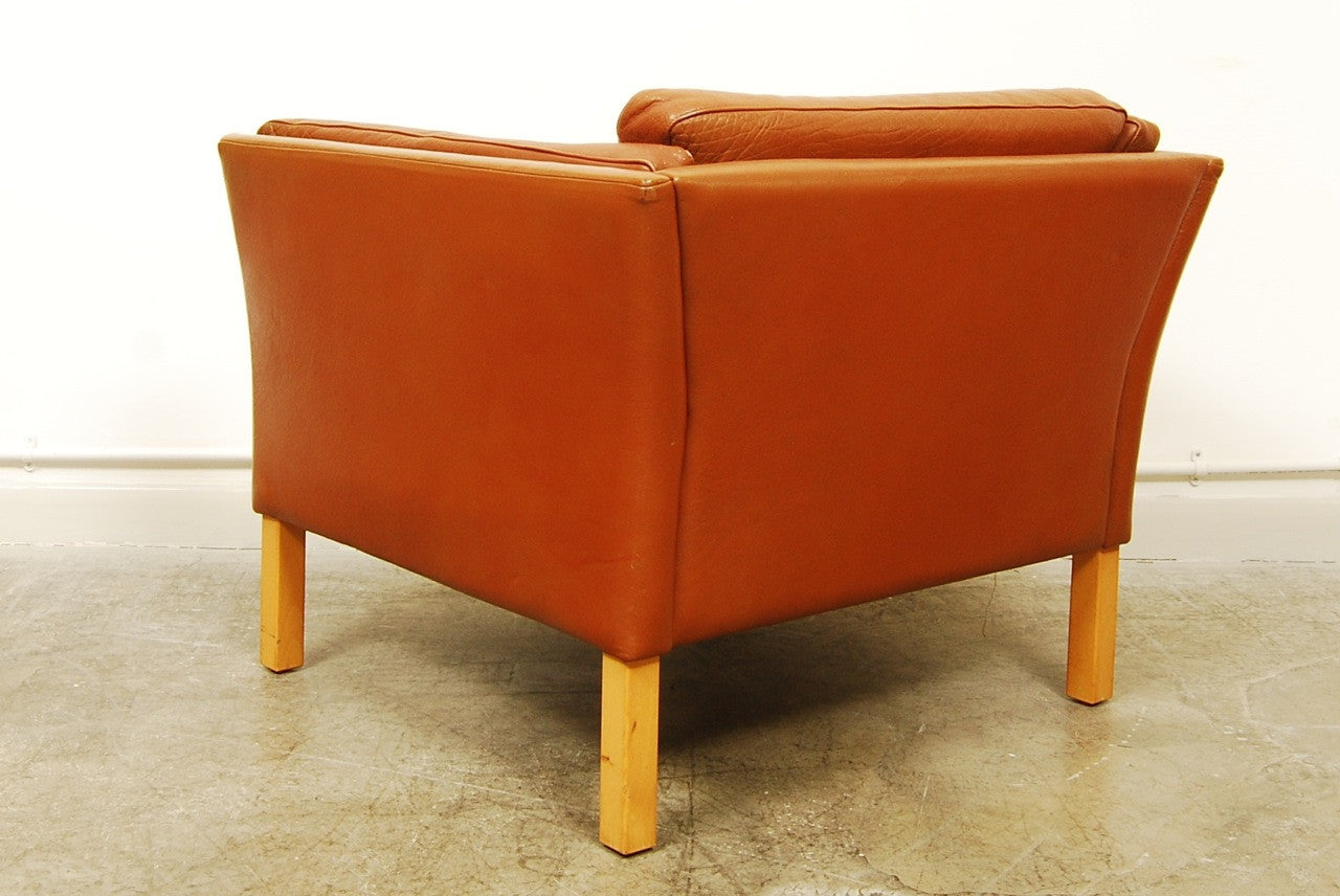 Tan leather club chair