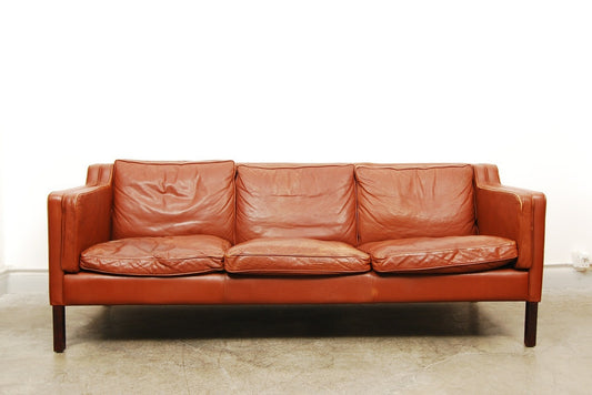 Three seat leather sofa by Stouby