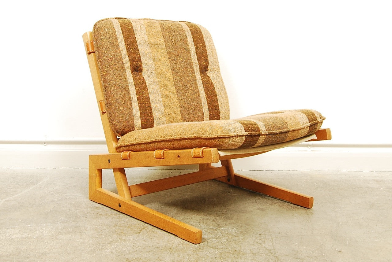 Low oak lounge chair