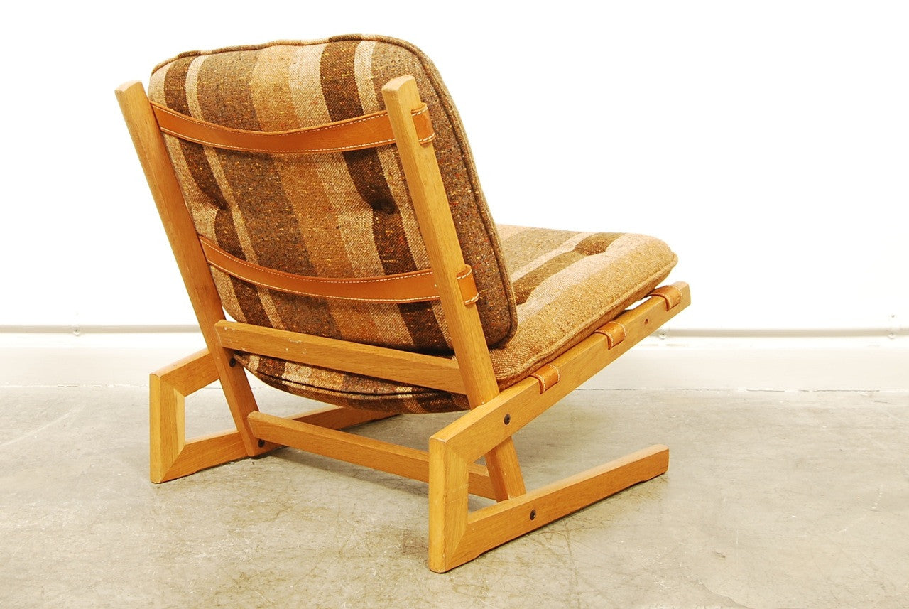 Low oak lounge chair