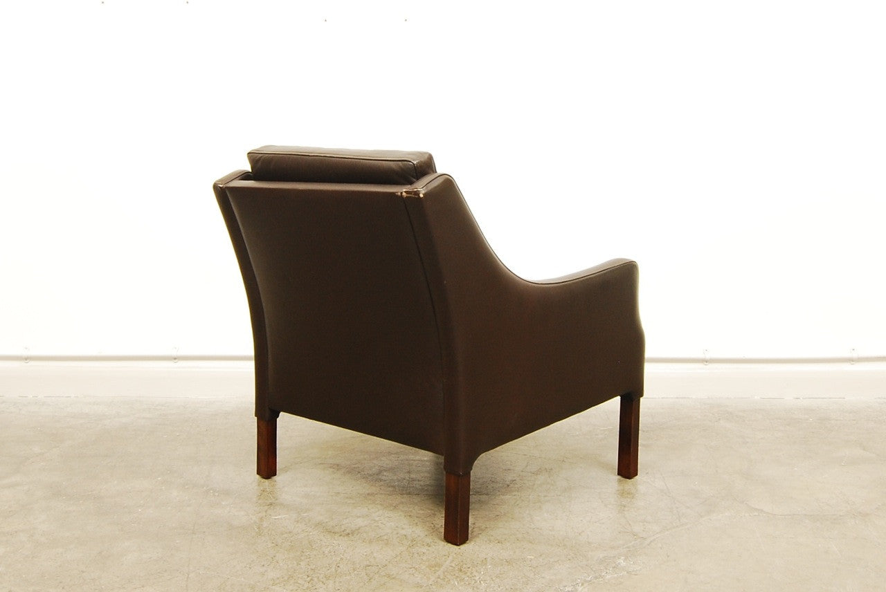 Brown leather club chair