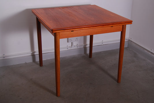 Square teak dining table